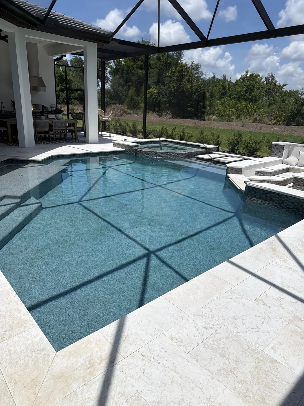 A clean residential pool serviced by K&V Pools